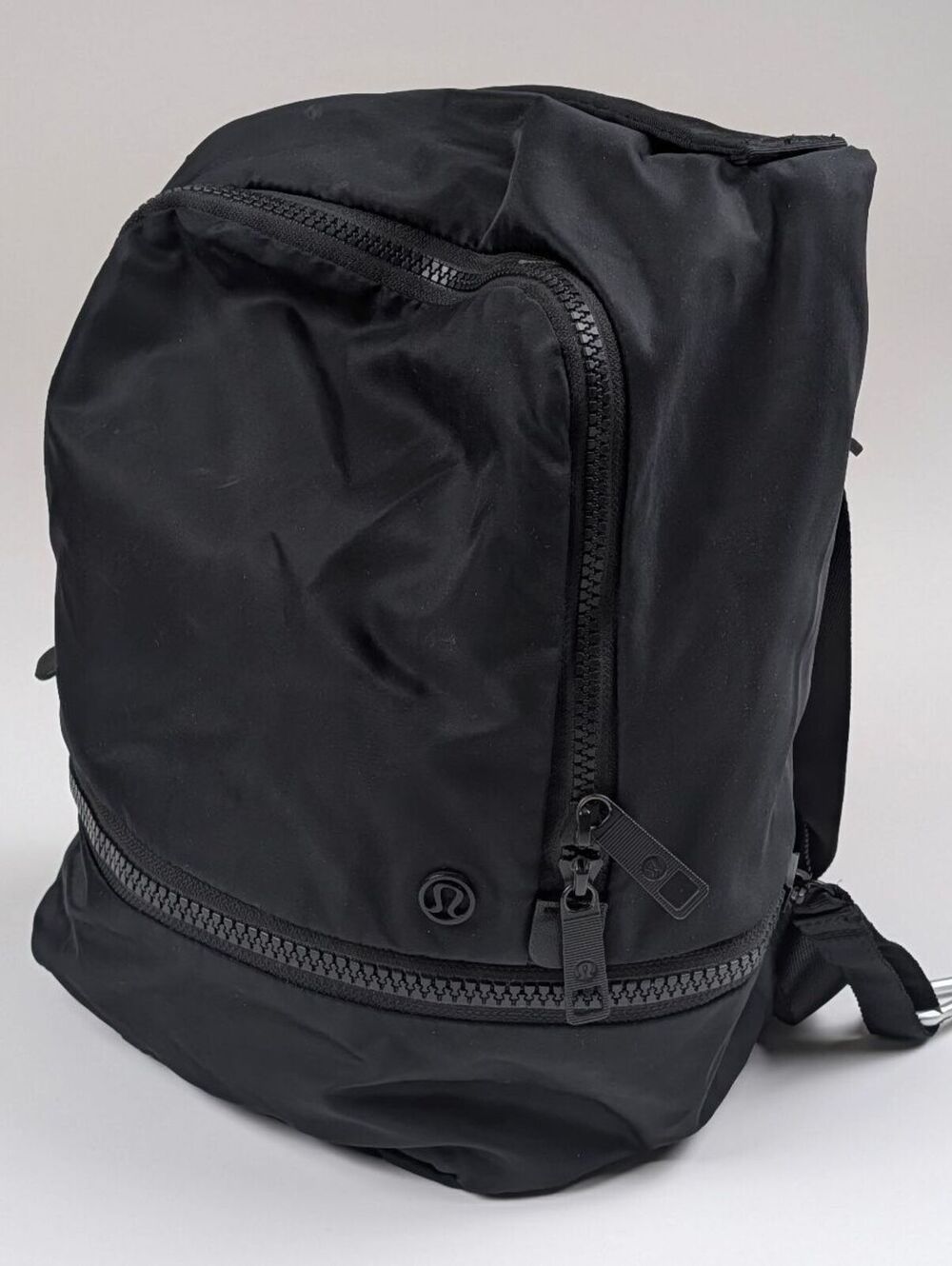 Lululemon Mini Backpack Black Nylon Athleisure Clean Fit Quiet Luxury Daypack